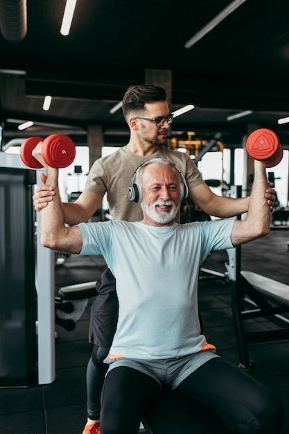Two men training with dumbbells in a gym